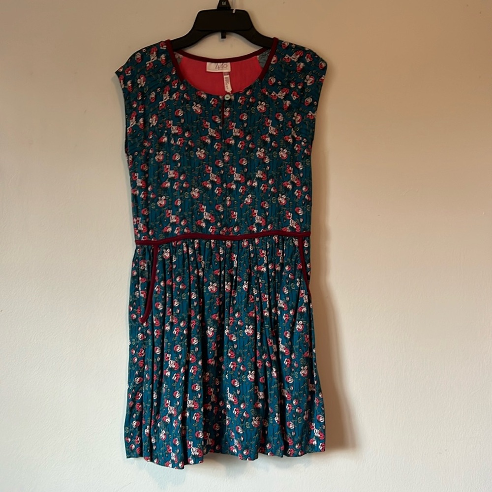 Girls size 12 casual blue dress with pockets.
